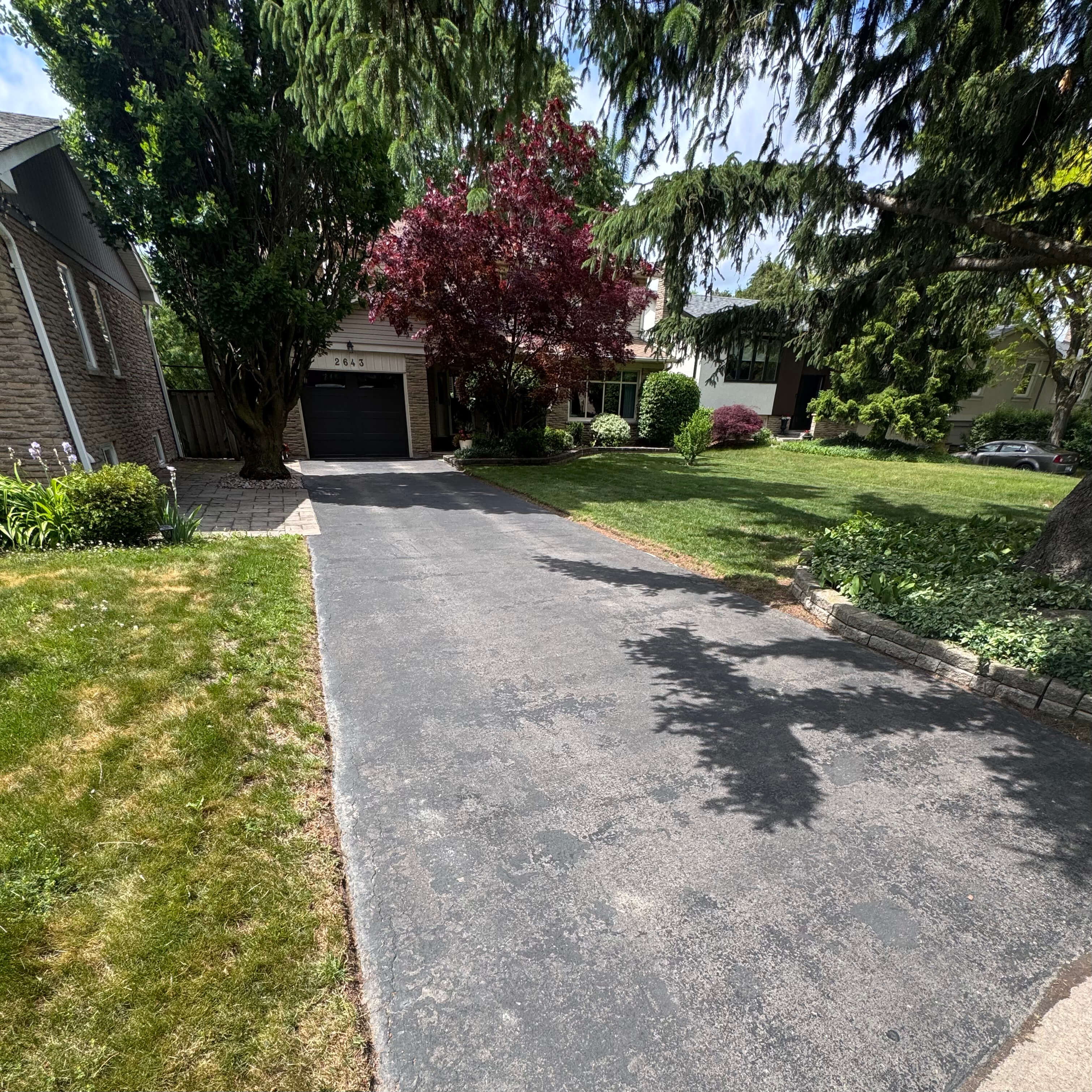 Before driveway sealing in Hamilton