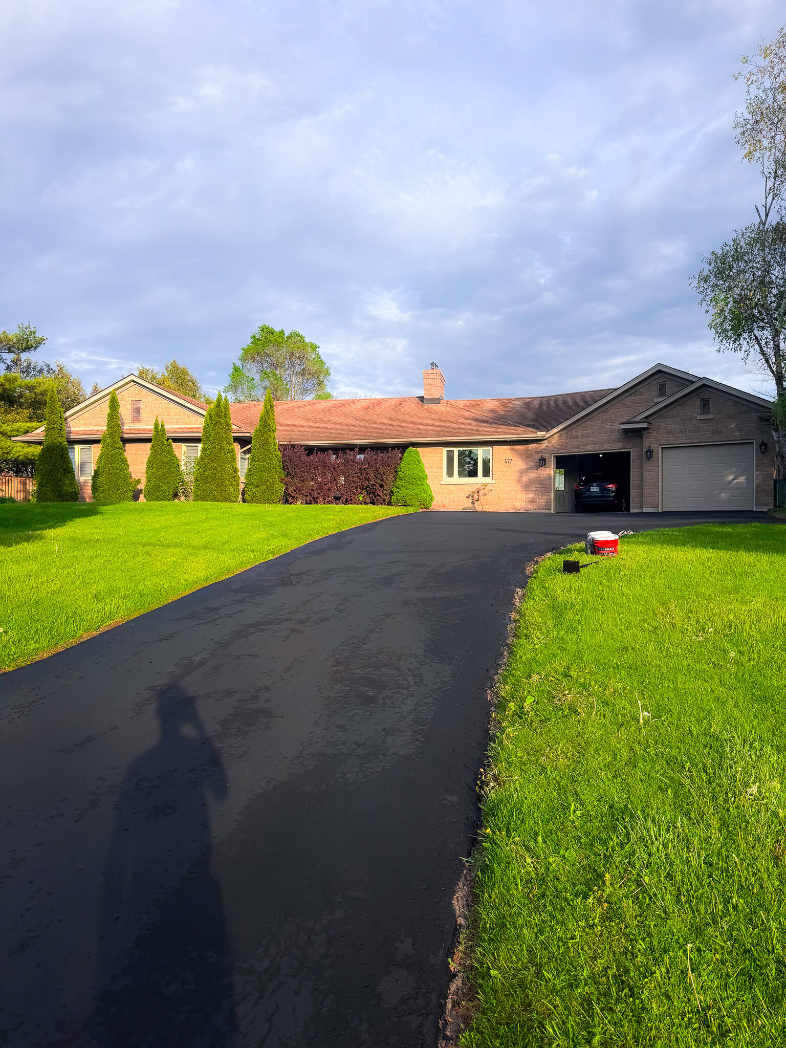 Fresh sealed blacktop driveway