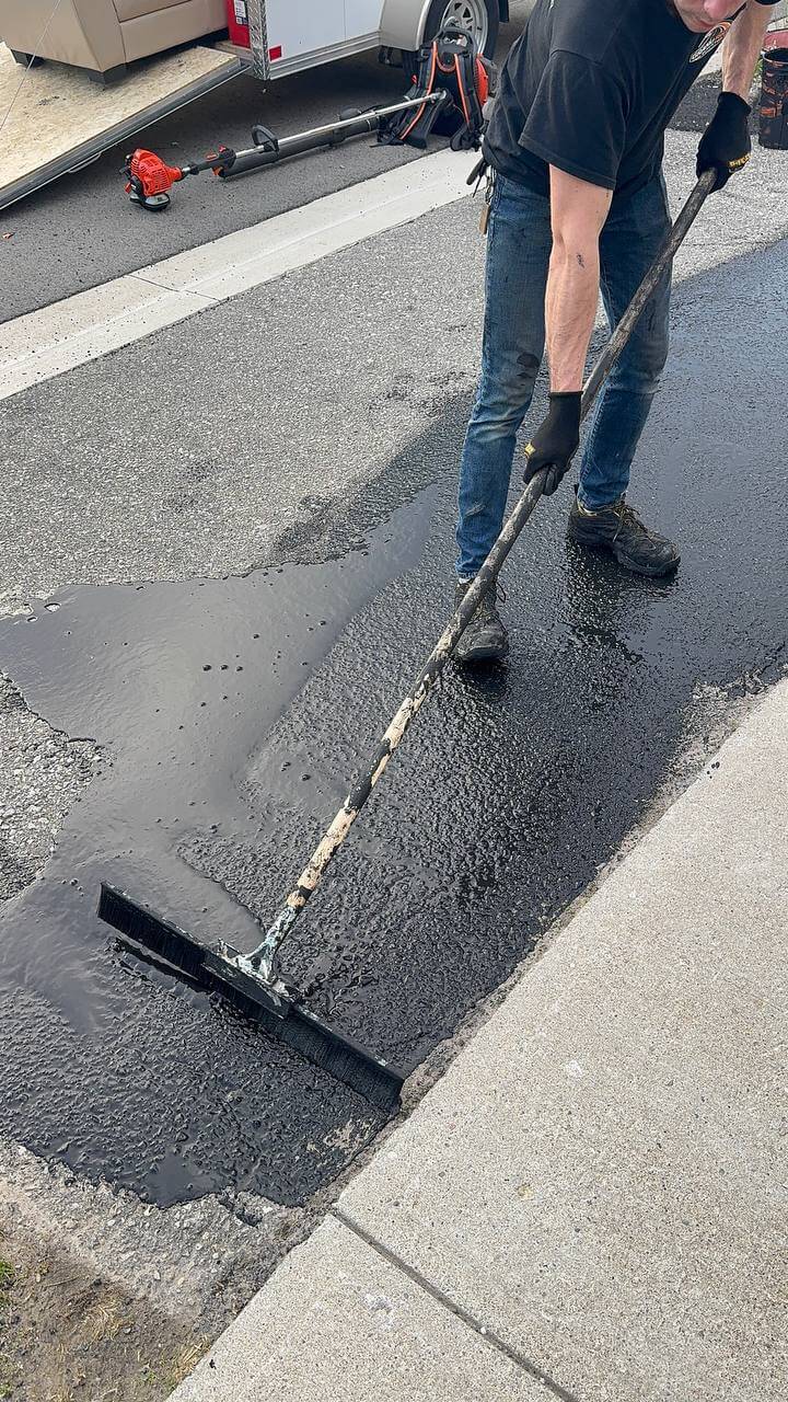 Brush applied driveway sealing